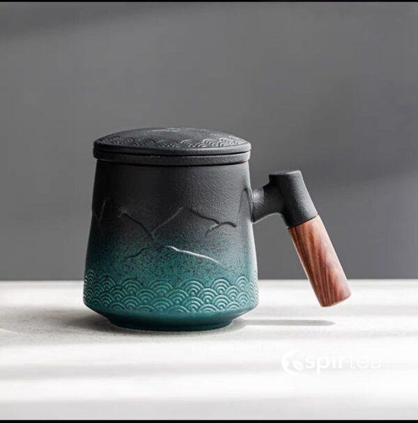 “Mountain” - Handmade Embossed Ceramic Tea Mug With Wooden Handle and Removable Infuser - Image 3